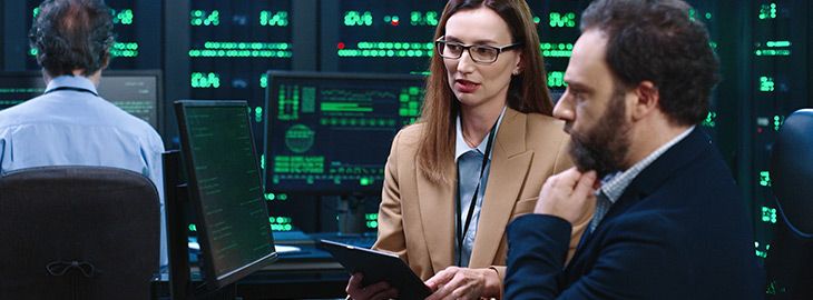 cybersecurity team monitoring programs running in a security operations lab