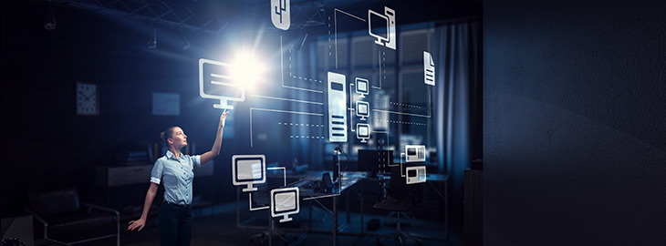 businesswoman tapping monitor icon on network diagram hologram