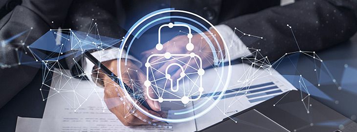 Two businesswomen working on the project to protect cyber security of international company. Padlock Hologram icons over the table with documents.